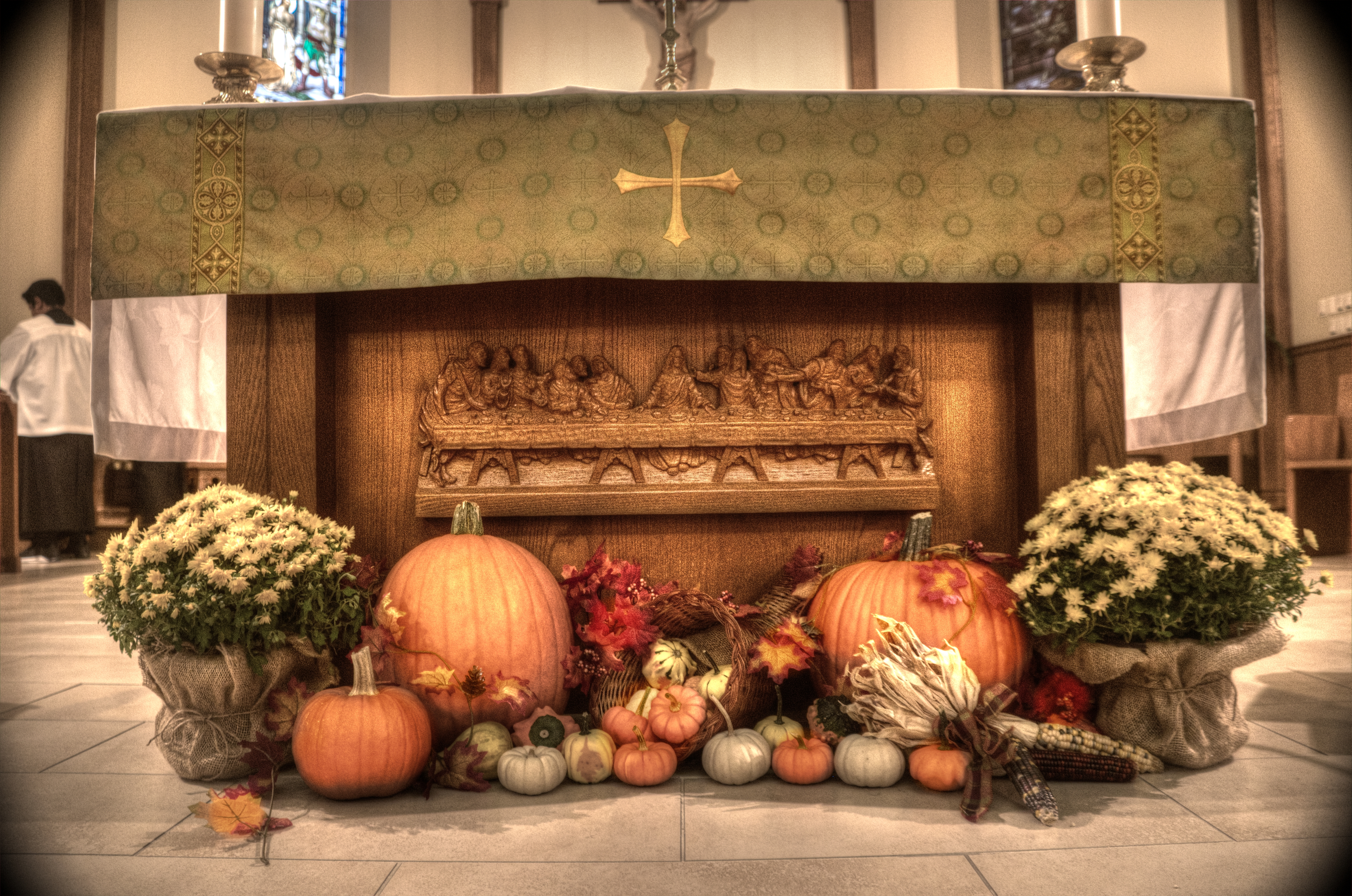 the altar of st margaret's decorated for the fall